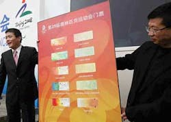 In this April 23, 2008 file photo, officials from the Beijing Organizing Committee for the Olympic Games unveil the design for tickets for the 2008 Olympic Games in Beijing. In a move unprecedented for the Olympics, tickets for both the opening and closin In this April 23, 2008 file photo, officials from the Beijing Organizing Committee for the Olympic Games unveil the design for tickets for the 2008 Olympic Games in Beijing. In a move unprecedented for the Olympics, tickets for both the opening and closin