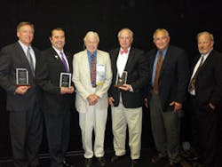 Left to right: Dave Simon, Jon Sargent, Bill Moody, Bill Cooper, Stan Martin and Ron Walters. Simon, Sargent and Cooper were on hand to receive the Moody award from SIAC&apos;s Ron Walters and executive director Stan Martin.