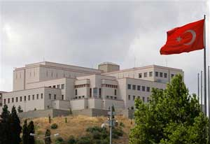 A Turkish flag, with the U.S. Consulate in the background, waves in Istanbul, Turkey, Wednesday, July 9, 2008. Armed men attacked a police guardpost outside the U.S. consulate in Istanbul on Wednesday. Turkish and U.S. officials called it 'a terrorist att