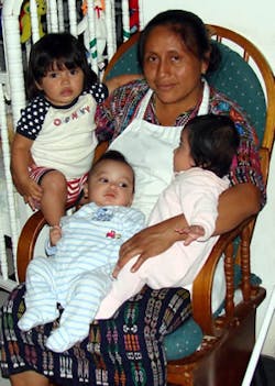 A caretaker at the orphanage A caretaker at the orphanage