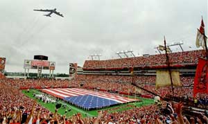 In this 1998 file photo, a B-52 bomber flies over Raymond James Stadium as the Tampa bay Buccaneers prepare to play their first football game at the stadium. Tampa will be hosting its fourth Super Bowl on Feb. 1, 2009. (AP Photo/File, Scott Martin)