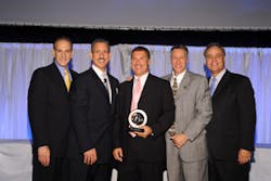 (Left to right): Kenneth Weinstein, senior vice president Program Marketing, Honeywell Security & Communications; Joe Sausa, president of First Alert Professional Security Systems; Joe Nuccio, president and CEO of ASG Security; Ron Rothman, president, Honeywell Security & Communications; and M. Greg McLochlin, director, Dealer Development Group present Nuccio the Medal of Honor. (Left to right): Kenneth Weinstein, senior vice president Program Marketing, Honeywell Security & Communications; Joe Sausa, president of First Alert Professional Security Systems; Joe Nuccio, president and CEO of ASG Security; Ron Rothman, president, Honeywell Security & Communications; and M. Greg McLochlin, director, Dealer Development Group present Nuccio the Medal of Honor.