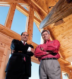 Blue Ridge Log Cabins’ (BRLC) owner and president Chip Smith (right) and Robert Rognstad, global account manager for systems integrator ADT Security Services, Boca Raton, Fla., (left) made it a team effort to not only monitor security for the BRLC manufacturing campus in Campobello, S.C. but to provide safety to employees and visitors as well. Photo courtesy of Conrad LaRosa, Showcase Marketing, Greenville, S.C. Blue Ridge Log Cabins’ (BRLC) owner and president Chip Smith (right) and Robert Rognstad, global account manager for systems integrator ADT Security Services, Boca Raton, Fla., (left) made it a team effort to not only monitor security for the BRLC manufacturing campus in Campobello, S.C. but to provide safety to employees and visitors as well. Photo courtesy of Conrad LaRosa, Showcase Marketing, Greenville, S.C.