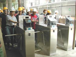 Macao construction workers, building a new casino, use hand geometry readers to enter the site. Macao construction workers, building a new casino, use hand geometry readers to enter the site.