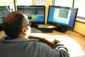 Paresh Desai, a member of the IT team at BAPS, demonstrates centralized control of the system and situational awareness facility wide.