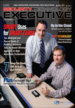 Tim McKnight (left), Vice President and Chief Information Security Officer, Northrop Grumman Corp., and Russell Koste, Director, Identity and Access Management, Northrop Grumman Information Systems, issue smart credentials in a High Assurance Credentialing Center in McLean, Va.