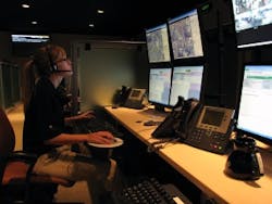 A Westec intervention specialist in the company's central command center interacts via audio and talks to one of their locations across the country. A Westec intervention specialist in the company's central command center interacts via audio and talks to one of their locations across the country.