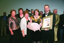 Michael Miller and his wife Debby display his 2010 Morris F. Weinstock Person of the Year Award and the latest issue of Newsline which features him on the cover. His sisters (left to right) Laurel Heinemann, Jolene Nelson and his mother Ruth Ann Pound surprised Miller at the awards ceremony. Past recipients of the Weinstock award were on stage to honor Miller on his accomplishments. Michael Miller and his wife Debby display his 2010 Morris F. Weinstock Person of the Year Award and the latest issue of Newsline which features him on the cover. His sisters (left to right) Laurel Heinemann, Jolene Nelson and his mother Ruth Ann Pound surprised Miller at the awards ceremony. Past recipients of the Weinstock award were on stage to honor Miller on his accomplishments.