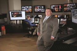 Mike Burnett is the surveillance director for Hollywood Casino in Indiana, which recently built a 24/7 command center. At back is Surveillance Technician Manager, Chris Krabbe.