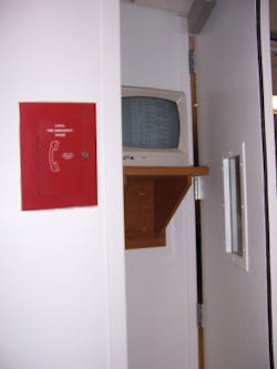 This is an example of a hospital's Private Mode textual visible notification appliance (CRT) which is located in a service corridor behind doors and out of site from the public. The voice communication system (left) will be used by the fire department to discuss the annunciated conditions as they occur in real time. This is an example of a hospital's Private Mode textual visible notification appliance (CRT) which is located in a service corridor behind doors and out of site from the public. The voice communication system (left) will be used by the fire department to discuss the annunciated conditions as they occur in real time.