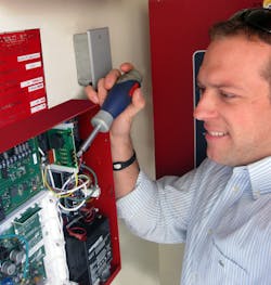ASG Security Sales Consultant, Justin MacDaniel, installs Honeywell IPGSM-DP fire alarm communicator at a luxury apartment complex. ASG Security Sales Consultant, Justin MacDaniel, installs Honeywell IPGSM-DP fire alarm communicator at a luxury apartment complex.