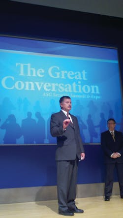 ASG's Phil Aronson (foreground) welcomes the crowd along with The Sage Group's Ron Worman (right). ASG's Phil Aronson (foreground) welcomes the crowd along with The Sage Group's Ron Worman (right).