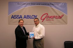 John Simon (r), CEO of General Supply, receives “official” ASSA ABLOY Authorized Channel Partner status from Lester LaPierre, director of business development for electronic access control for ASSA ABLOY Door Security Solutions. John Simon (r), CEO of General Supply, receives “official” ASSA ABLOY Authorized Channel Partner status from Lester LaPierre, director of business development for electronic access control for ASSA ABLOY Door Security Solutions.