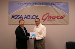 John Simon (r), CEO of General Supply, receives &ldquo;official&rdquo; ASSA ABLOY Authorized Channel Partner status from Lester LaPierre, director of business development for electronic access control for ASSA ABLOY Door Security Solutions.