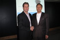 From l-r: March Networks CEO Peter Strom shakes hands with Infinova CEO Jeffrey Liu.