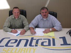 Chris Tolliver, operations manager, and Chris Utter, a partner in Central 1 Security, embrace the future with new ways of securing RMR for the Wisconsin-based company. Chris Tolliver, operations manager, and Chris Utter, a partner in Central 1 Security, embrace the future with new ways of securing RMR for the Wisconsin-based company.
