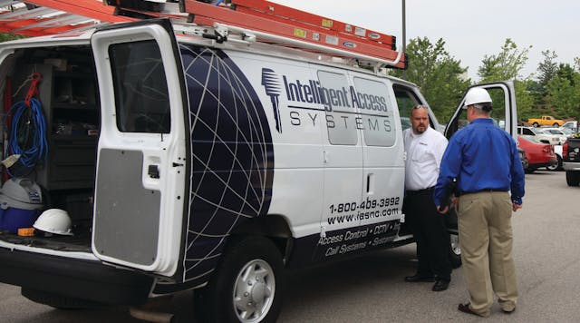 Derek Bischoff and Tim Bullock (blue shirt) load up for a day&rsquo;s work out of the Raleigh office of Intelligent Access Systems.