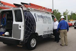 Derek Bischoff and Tim Bullock (blue shirt) load up for a day’s work out of the Raleigh office of Intelligent Access Systems. Derek Bischoff and Tim Bullock (blue shirt) load up for a day’s work out of the Raleigh office of Intelligent Access Systems.