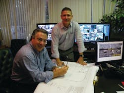 Ken Mara, President & CEO, and Joseph Cestra, Technical Services Director, review Vanderbilt plans. Ken Mara, President & CEO, and Joseph Cestra, Technical Services Director, review Vanderbilt plans.