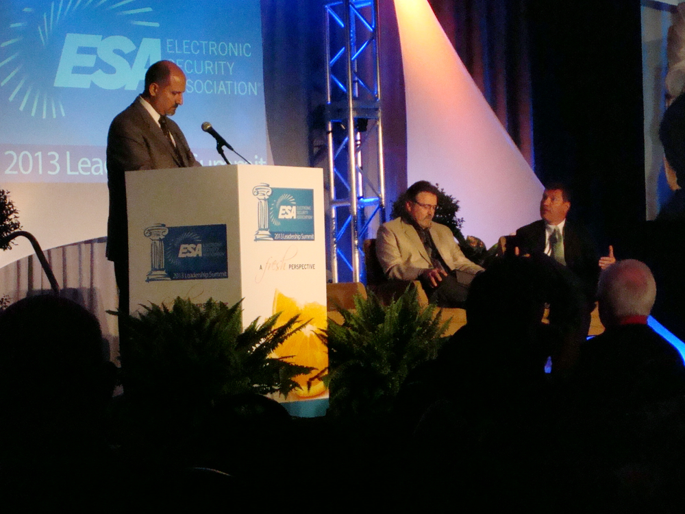 Merlin Guilbeau, Executive Director of ESA discusses survey findings with (L-R) Michael Pope of STI and Joe Nuccio of ASG Security