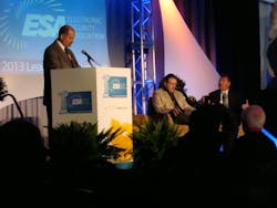 Merlin Guilbeau, Executive Director of ESA discusses survey findings with (L-R) Michael Pope of STI and Joe Nuccio of ASG Security
