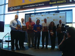 (L to R) Fast50 companies, X7; Securityhunter; Netronix Integration; American Integrated Security Group; Tech Systems; SD&amp;I Editor O&apos;Mara; and Kratos Public Safety &amp; Security with accolades at ISC West 2013.