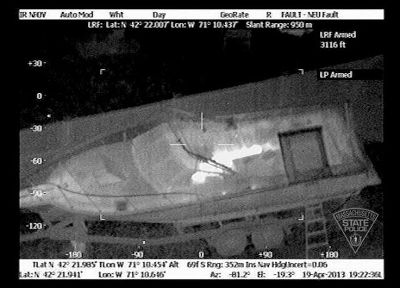 An image is seen from a Massachusetts State Police helicopter equipped with a FLIR Star SAFIRE III camera that helped locate bombing suspect Dzhokhar Tsarnaev.