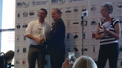 Ian Johnston, president and CEO of Innovative Security Designs, receives his Best in Show NPS Award from SIA Chief Operating Officer Rand Price. Ian Johnston, president and CEO of Innovative Security Designs, receives his Best in Show NPS Award from SIA Chief Operating Officer Rand Price.