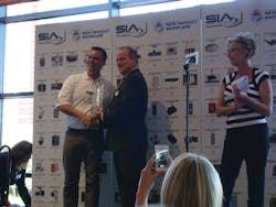 Ian Johnston, president and CEO of Innovative Security Designs, receives his Best in Show NPS Award from SIA Chief Operating Officer Rand Price.