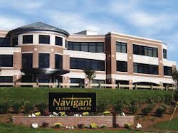 Navigant Credit Union has 13 locations. Branches are typically around 4,000 square feet, featuring the usual configuration of drive-through lanes, ATMs, night depositories and other member-service areas. Cameras watch it all, with pan-tilt-zoom (PTZ) cameras “sweeping” the parking lots. Inside, cameras monitor who enters the vault lobby, and view each teller line. Navigant Credit Union has 13 locations. Branches are typically around 4,000 square feet, featuring the usual configuration of drive-through lanes, ATMs, night depositories and other member-service areas. Cameras watch it all, with pan-tilt-zoom (PTZ) cameras “sweeping” the parking lots. Inside, cameras monitor who enters the vault lobby, and view each teller line.