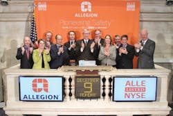 Allegion Chariman, President and CEO Dave Petratis (center) rings the opening bell at the New York Stock Exchange on Monday with other company executives. Allegion Chariman, President and CEO Dave Petratis (center) rings the opening bell at the New York Stock Exchange on Monday with other company executives.