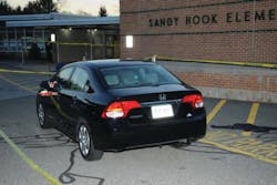 This photo released last month in the long-anticpated report on the Sandy Hook Elementary School shooting shows the car of shooter Adam Lanza parked outside the school. This photo released last month in the long-anticpated report on the Sandy Hook Elementary School shooting shows the car of shooter Adam Lanza parked outside the school.