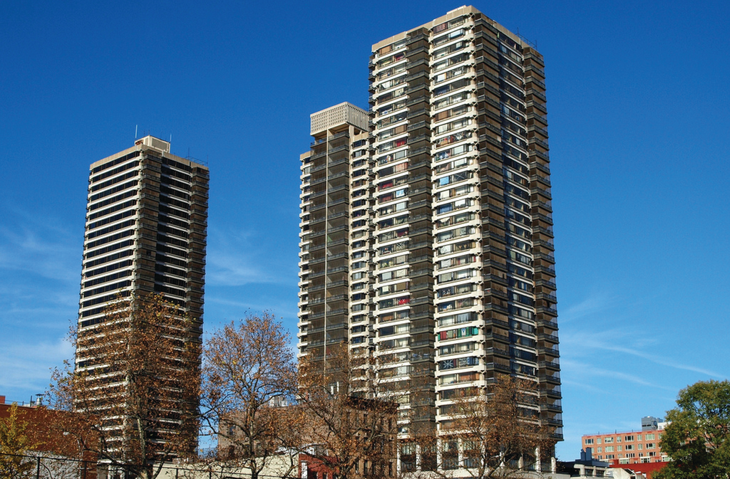 Spanning an entire city block, the Taino Towers complex boasted a four-story central building surrounded by four 35-story glass and concrete towers. The project was known as a &ldquo;pilot block,&rdquo; meant to serve as a new urban model for the integration of low-income housing into large cities across the United States.