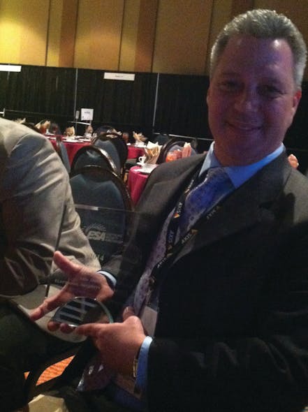 Joe Parisi of Rapid Response Monitoring was named Chapter President of the Year by the ESA.