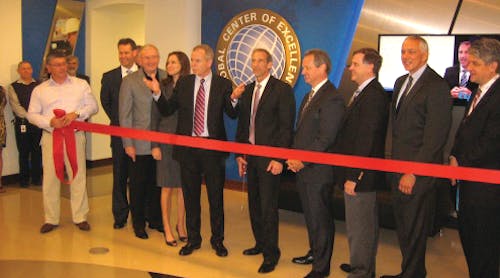 Tyco executives prepare to cut the ribbon at the company&apos;s newly expanded Global Center of Excellence on Monday in Birmingham, Ala.