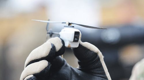 A Black Hornet nano helicopter UAV used by the British Army.