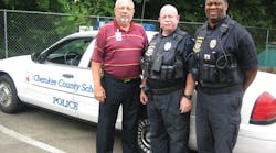 Mark Kissel, Cherokee Country Schools&apos; Chief of Police stands outside the district&apos;s command center with police officers Todd Maloney and Brian Stevenson.