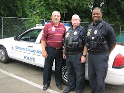 Mark Kissel, Cherokee Country Schools&apos; Chief of Police stands outside the district&apos;s command center with police officers Todd Maloney and Brian Stevenson.
