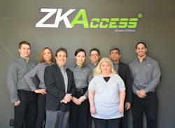 The ZKAccess Team (L-R): Cory Harrell - Support Engineer, Neysha Castillo - Sales Executive, Larry Reed - CEO, Olga Barbanel - Sales and Marketing Manager, Delmar Dossantos - Support Engineer, Sherry Zemanek - Accounting Manager, Manish Dalal - COO and Product Manager, and Michael Cabrera - Shipping and Logistics Coordinator.