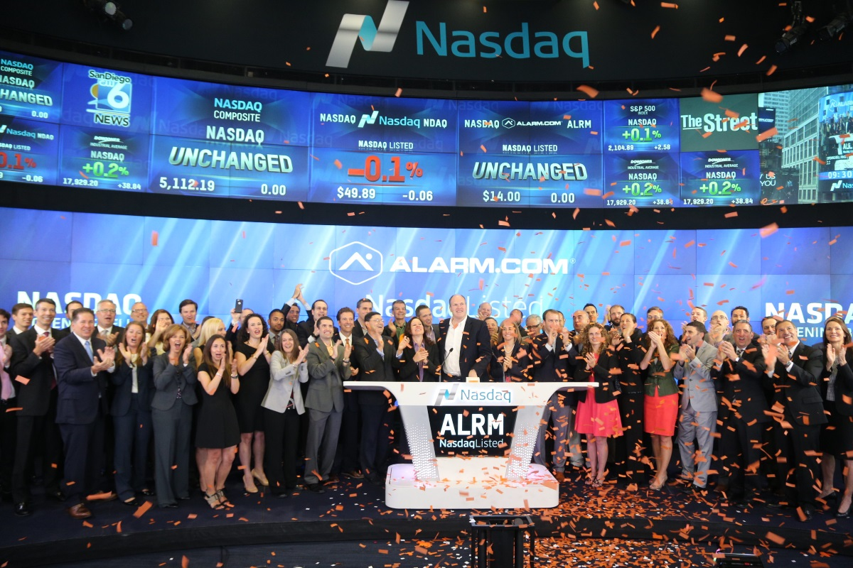 Alarm.com's executive team celebrates as the company officially launches its initial public offering on the NASDAQ.
