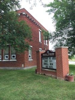 The 130-student campus consists of a church, rectory with administrative offices and private K-8 school all on one large campus in a rural area. The 130-student campus consists of a church, rectory with administrative offices and private K-8 school all on one large campus in a rural area.