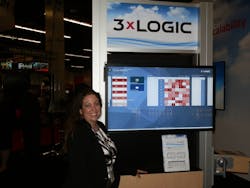 Wendi Burke, senior director of marketing for 3xLOGIC, stands in front of the company's booth at ASIS 2015. Wendi Burke, senior director of marketing for 3xLOGIC, stands in front of the company's booth at ASIS 2015.