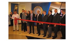 Tyco executives prepare to cut the ribbon at the company's newly expanded Global Center of Excellence in Birmingham, Ala. and plan global expansion of these sites in the near future. Tyco executives prepare to cut the ribbon at the company's newly expanded Global Center of Excellence in Birmingham, Ala. and plan global expansion of these sites in the near future.