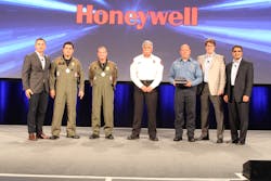 Members of the Phoenix Fire and Police Department who helped save two lives in an extreme flood rescue were honored by Marek Robinson (far left), President of Honeywell Authorized Dealer Programs. Members of the Phoenix Fire and Police Department who helped save two lives in an extreme flood rescue were honored by Marek Robinson (far left), President of Honeywell Authorized Dealer Programs.