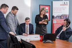 A3 Communications’ executive team. From left to right: Brian Thomas (President); Chad Hendrix (Vice President – Engineering); Dave Lewis (Chief Financial Officer); Michelle Moshinskie (Director of Marketing); and Scott Grainger (Vice President – Physical Security). A3 Communications’ executive team. From left to right: Brian Thomas (President); Chad Hendrix (Vice President – Engineering); Dave Lewis (Chief Financial Officer); Michelle Moshinskie (Director of Marketing); and Scott Grainger (Vice President – Physical Security).