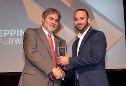 OnSSI’s Mulli Diamant receives award from Hanwah Techwin America’s Kyrilloas Mossad. OnSSI’s Mulli Diamant receives award from Hanwah Techwin America’s Kyrilloas Mossad.