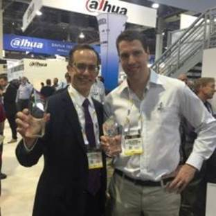 James Marcella (left), Director of Technical Services, and David Johansson (right), Global Product Manager, New Solutions accepted the SIA New Product Showcase award for AXIS Perimeter Defender and AXIS Q61 PTZ Dome Network Camera Series at ISC West.