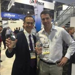 James Marcella (left), Director of Technical Services, and David Johansson (right), Global Product Manager, New Solutions accepted the SIA New Product Showcase award for AXIS Perimeter Defender and AXIS Q61 PTZ Dome Network Camera Series at ISC West. James Marcella (left), Director of Technical Services, and David Johansson (right), Global Product Manager, New Solutions accepted the SIA New Product Showcase award for AXIS Perimeter Defender and AXIS Q61 PTZ Dome Network Camera Series at ISC West.