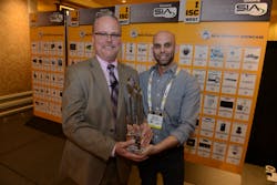 Rand Price, Chief Operating Officer of the Security Industry Association, awards Yuval Taub of LYNX TFG Ltd., Best New Product in the 2016 SIA New Product Showcase. Rand Price, Chief Operating Officer of the Security Industry Association, awards Yuval Taub of LYNX TFG Ltd., Best New Product in the 2016 SIA New Product Showcase.