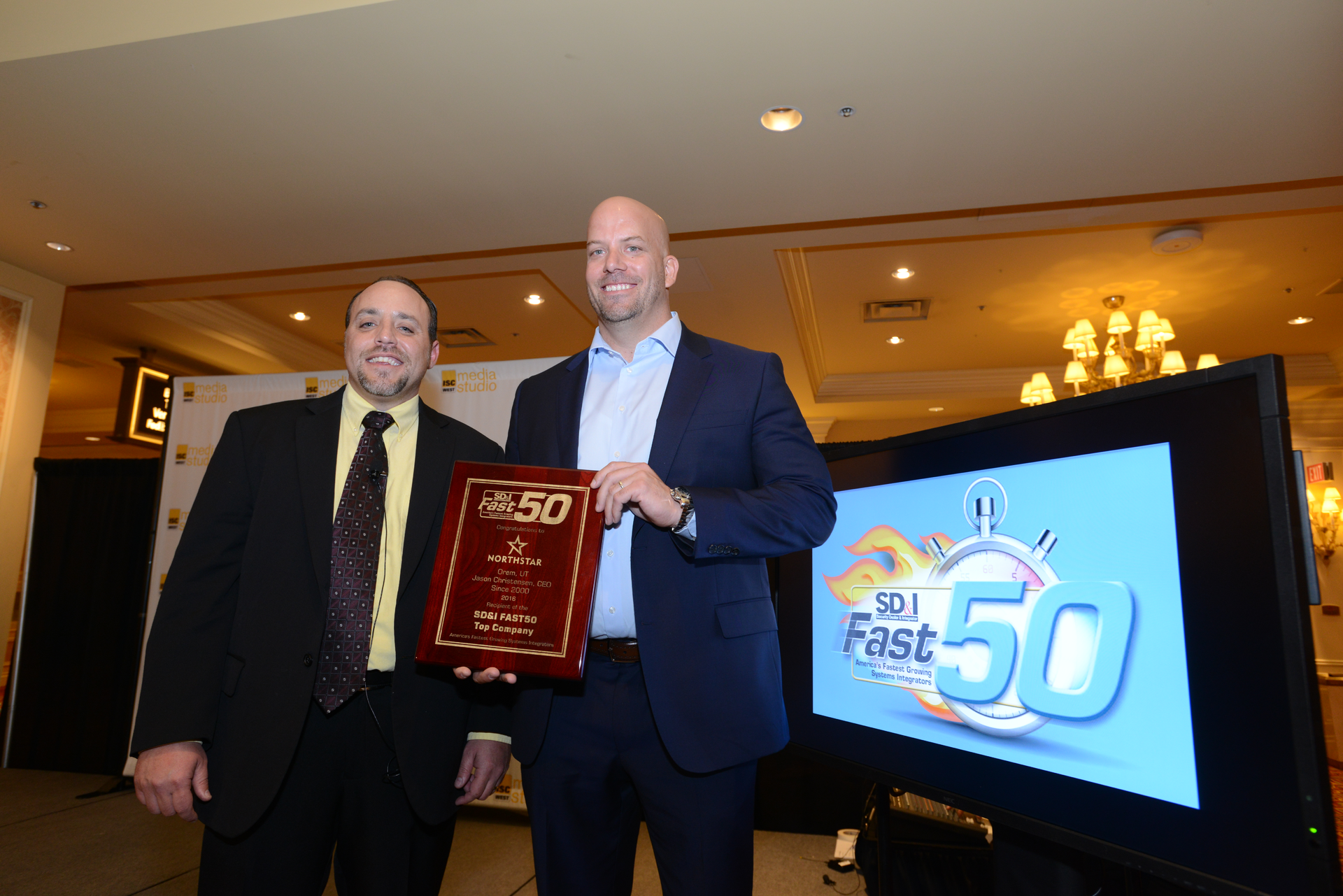 Dan Noble, COO of top-ranked NorthStar Home, receives the Fast50 award from Editor-in-Chief Paul Rothman. NorthStar is the first No. 1-ranked company with a nearly 100% focus on residential security in the five-year history of the Fast50.